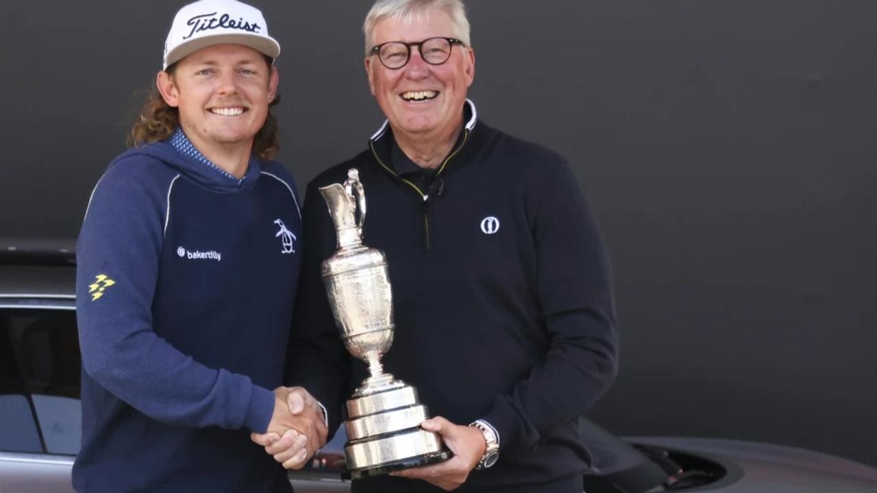  Martin Slumbers, the Chief Executive of The R&A and Secretary of The Royal and Ancient Golf Club St Andrews, with the Claret Jug trophy