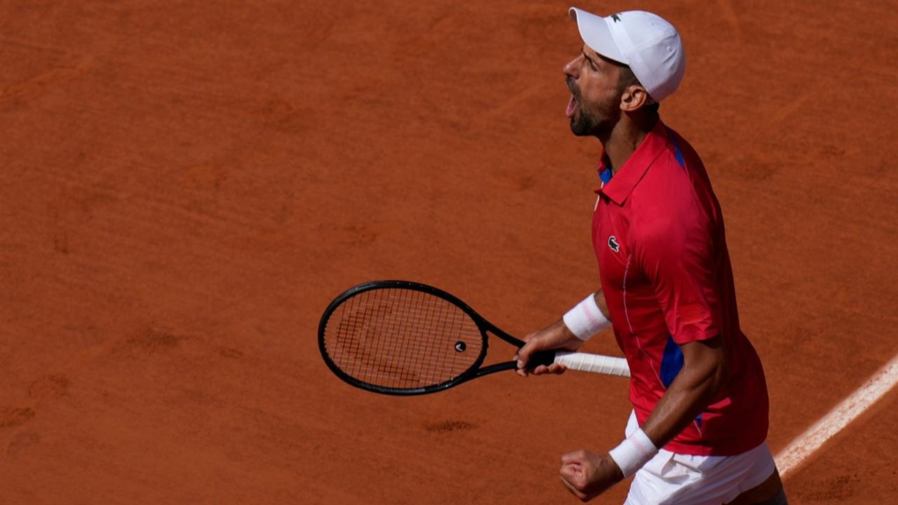 Novak Djokovic celebrates vs Carlos Alcaraz at Paris Olympics