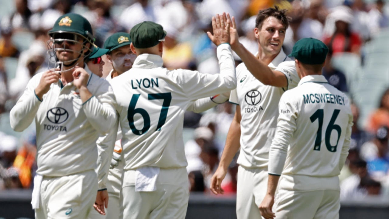 Pat Cummins celebrates a fall of wicket