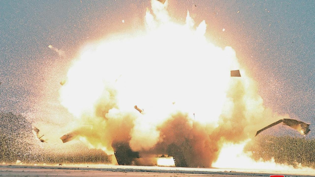 Photo shows an explosion after it says a drone crashed into a target in a demonstration, as its leader Kim Jong Un was inspecting at an undisclosed location in North Korea. 