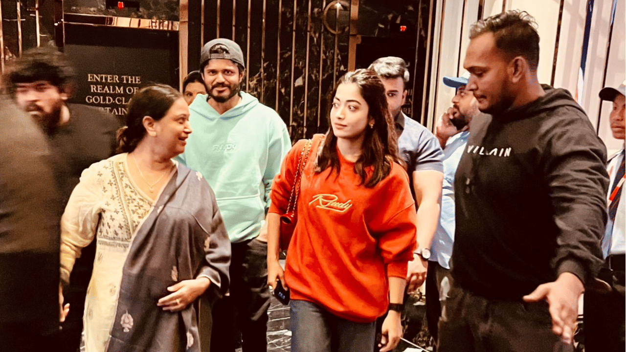 Rashmika Mandanna snapped with Vijay Deverakonda's family at Hyderabad theatre.