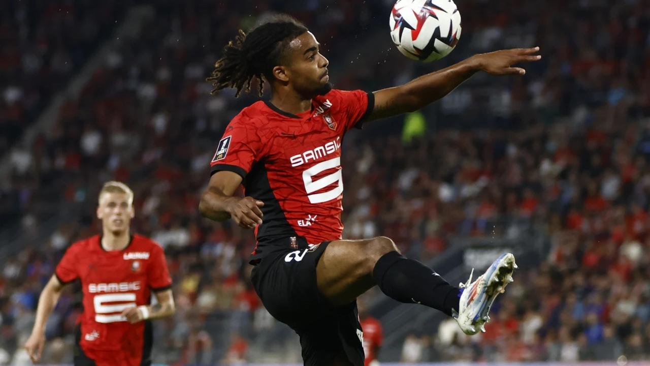 Rennes’ Lorenz Assignon controls the ball 