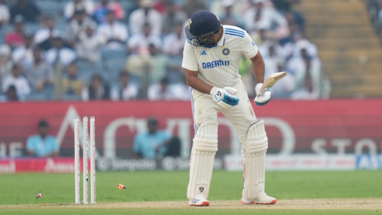 Rohit Sharma looks back after being dismissed