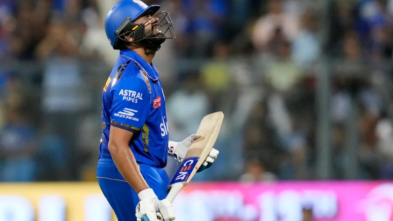 Rohit Sharma walks away after being dismissed