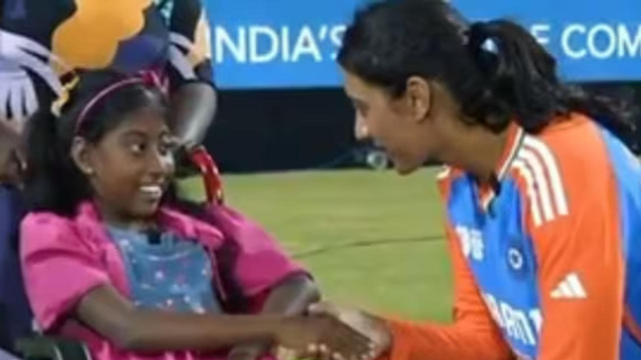 Smriti Mandhana gifts mobile phone to wheelchair-bound girl.