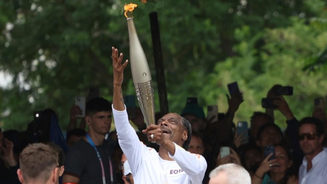 Snoop Dogg with Olympic Torch