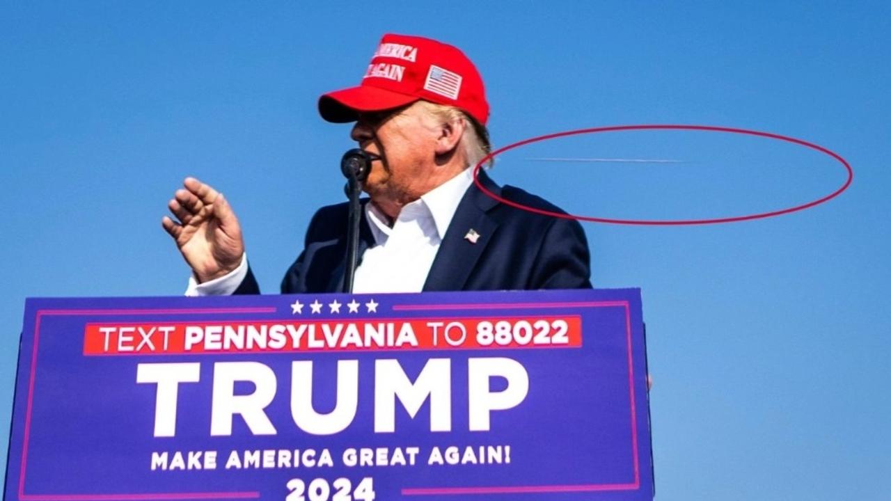 Photo by New York Times photographer Doug Mills shows a bullet flying just behind Trump's head.