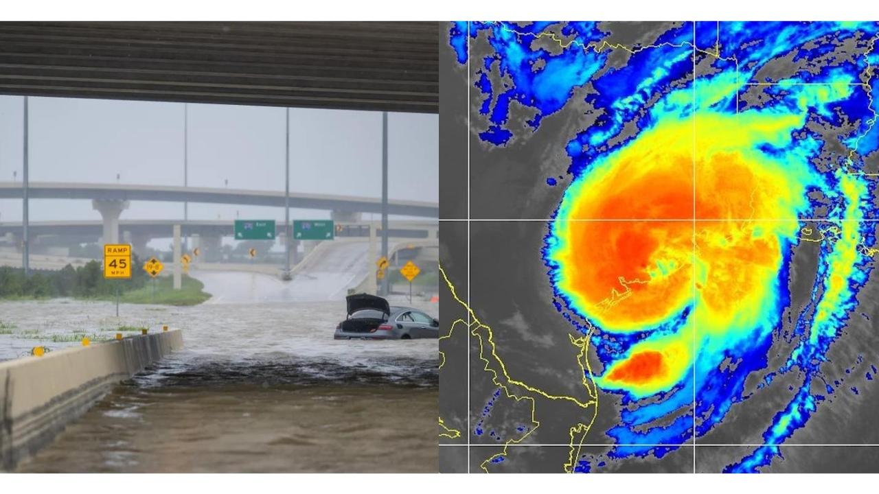 A vehicle is left abandoned in floodwater on a highway after Hurricane Beryl swept through the area on Monday in Houston.