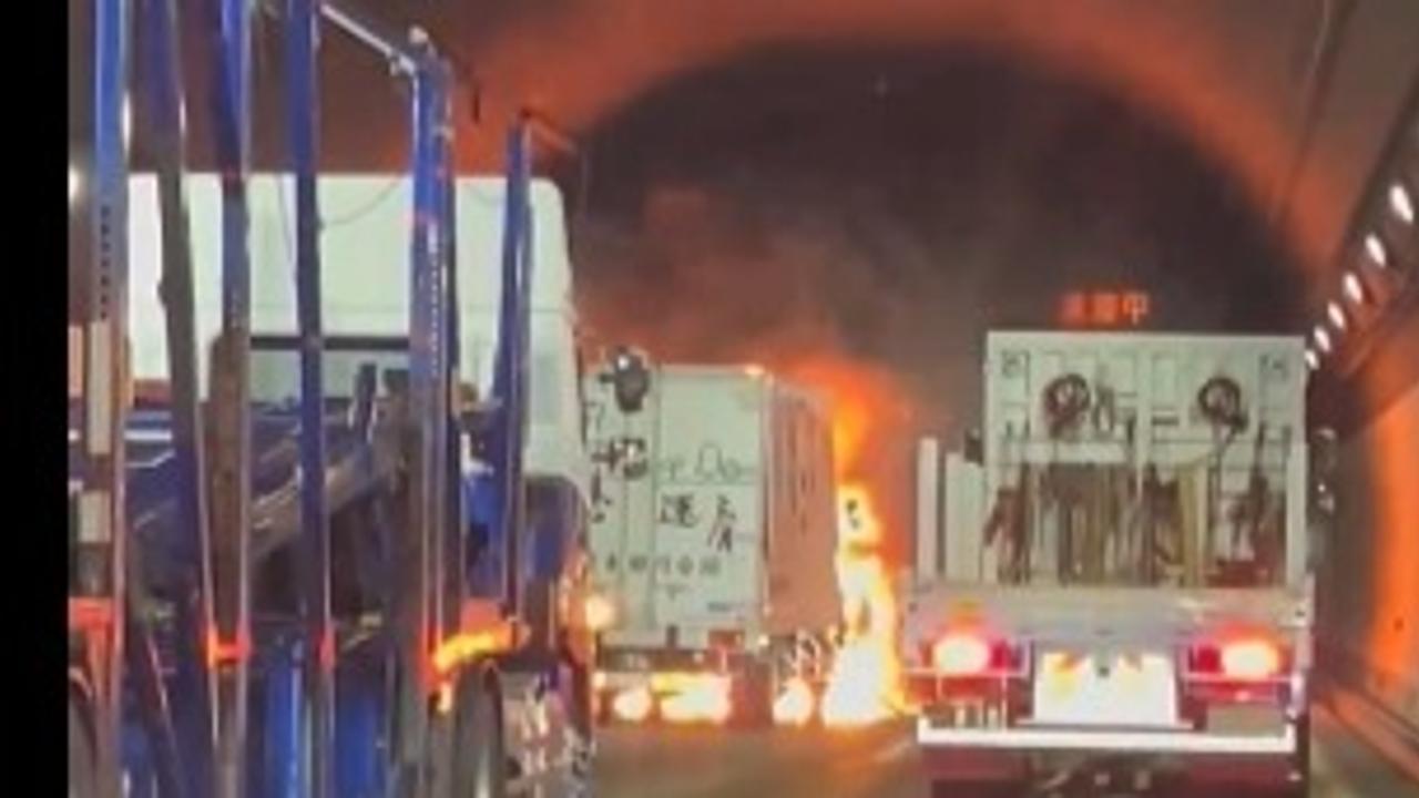 Visuals from the scene show the truck ablaze, with thick smoke filling the tunnels. 