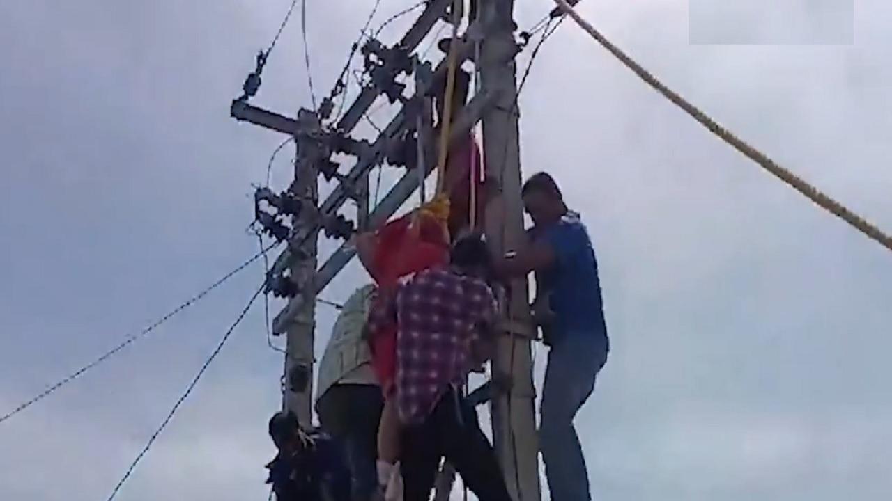 Women Clime on Pole