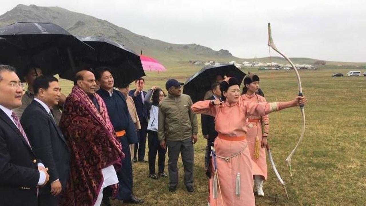 IN PICTURES: Rajnath Singh takes part in Archery in Mongolia; watches folk-dance, wrestling and samples nomadic fare