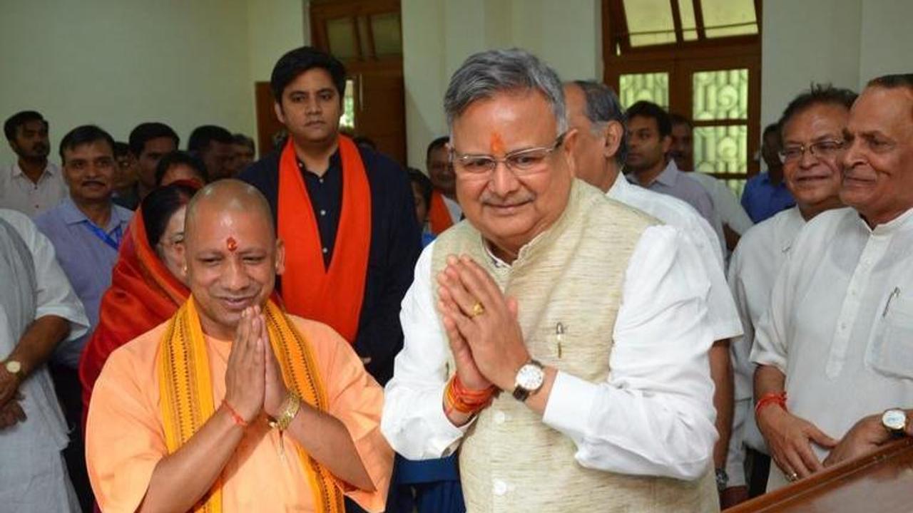 Chhattisgarh elections: CM Raman Singh touches Yogi Adityanath's feet and seeks blessings while filing nomination