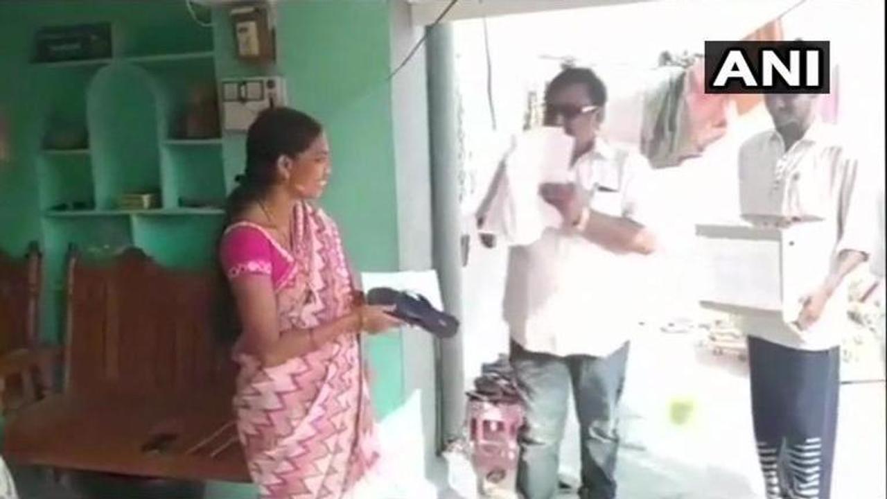 'Hit me with this slipper if I don't work', Telangana's candidate distributes slippers to voters as part of election campaign