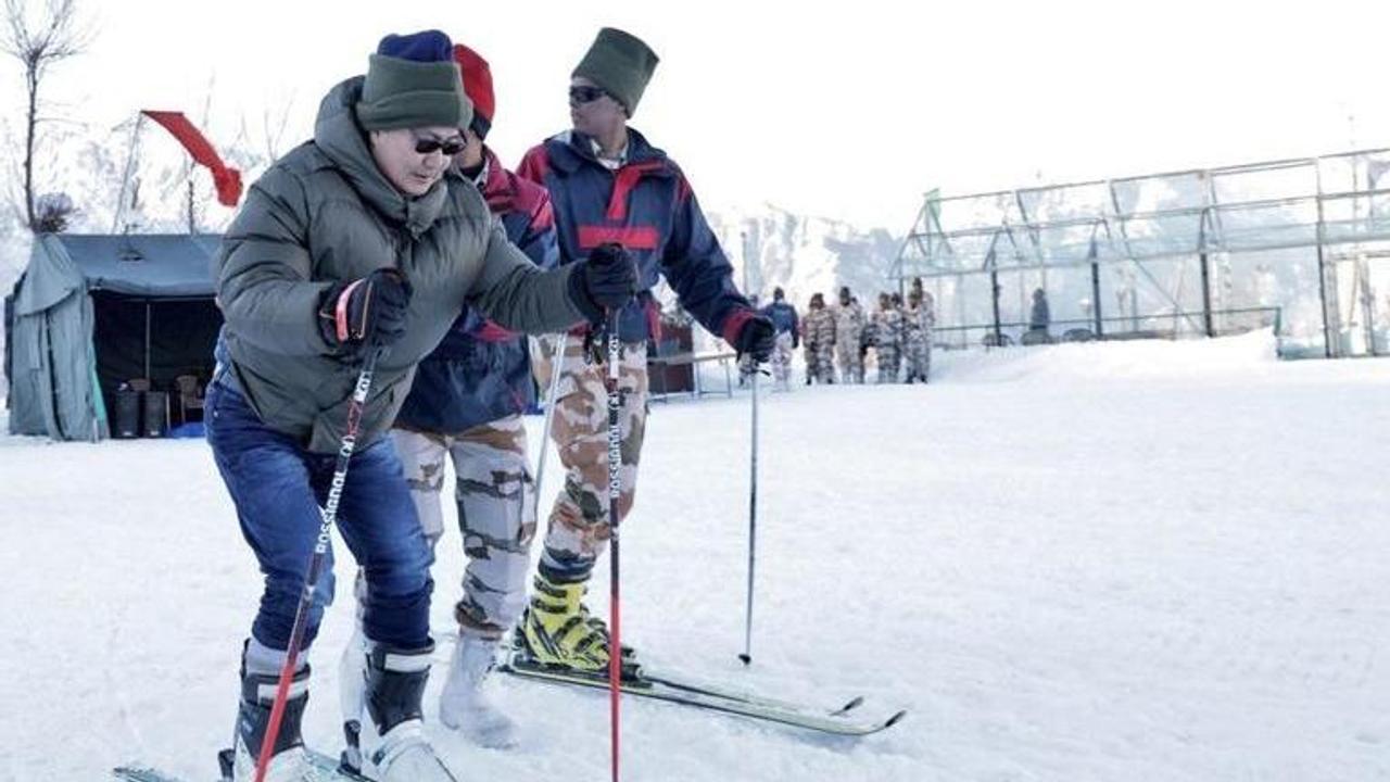 WATCH: Union Minister Kiren Rijiju takes a joyride on snow scooter along with ITBP & SSB officers in Auli, Uttarakhand