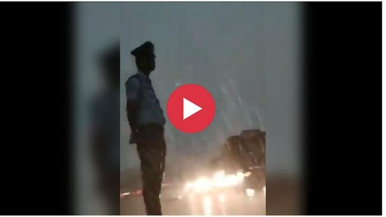 'Superman of Assam': Traffic cop fights thunder and blinding rain, stands like a mountain to perform his duty