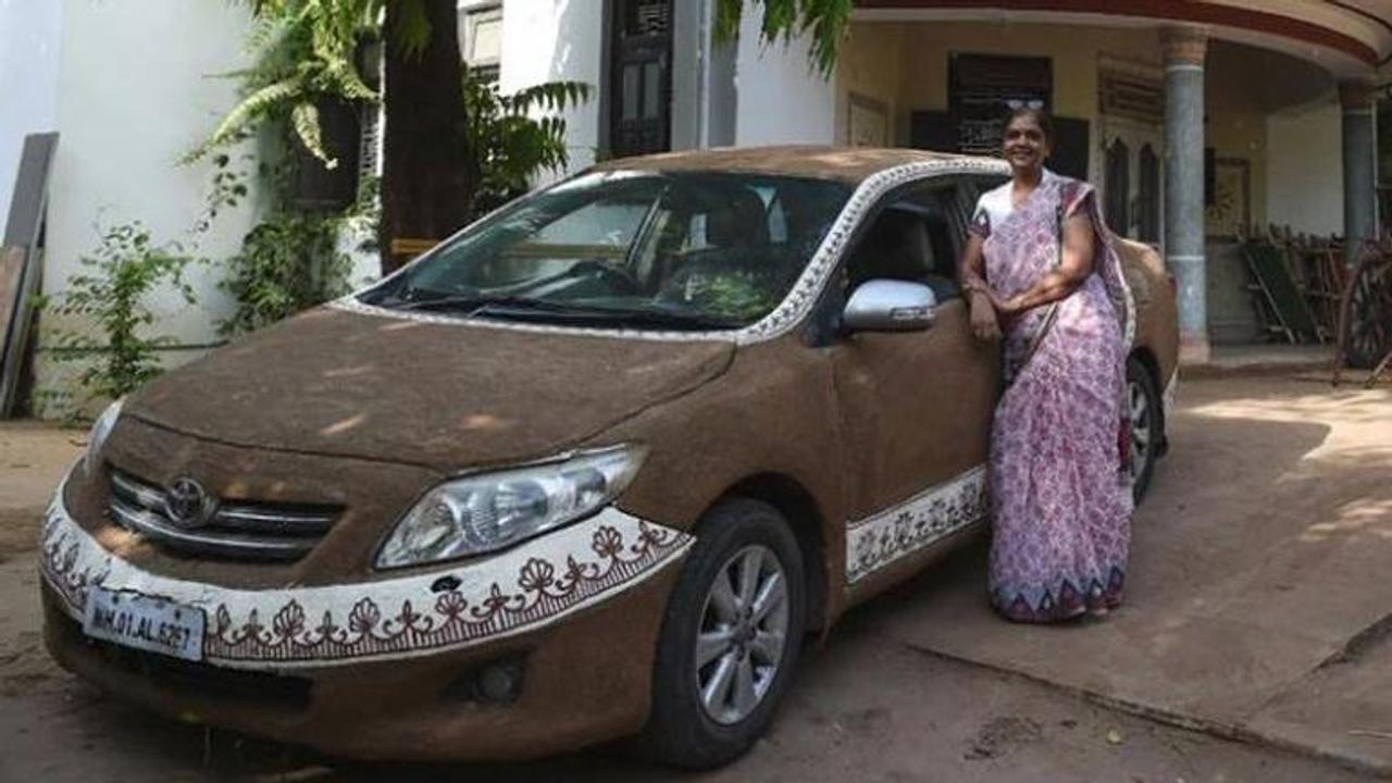 Gujarat woman coats her Sedan with cow dung, puts rangoli-like designs on the edges for this 'cool' reason