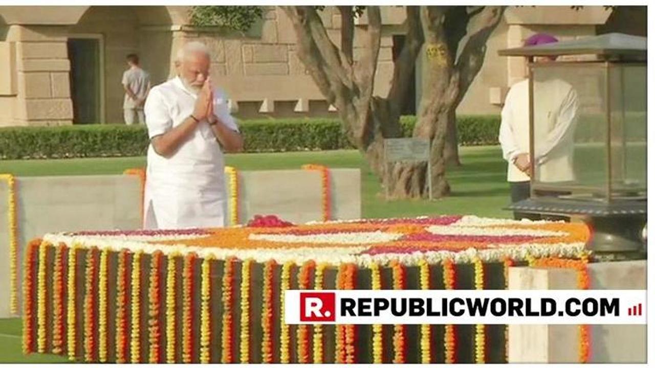 Watch: PM Modi pays tribute to Mahatma Gandhi at Rajghat hours before the swearing-in ceremony