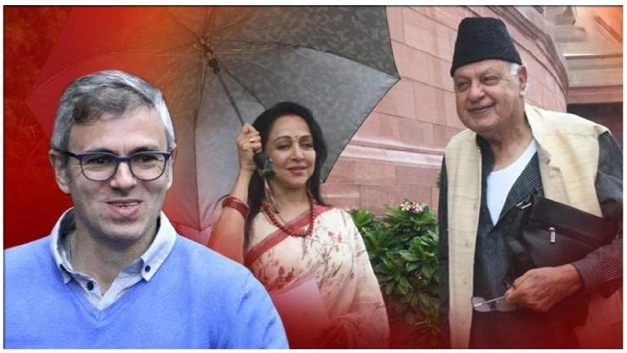 Her broom-work may be awry but Omar Abdullah clearly agrees with Hema Malini's umbrella-holding skills. Here's proof