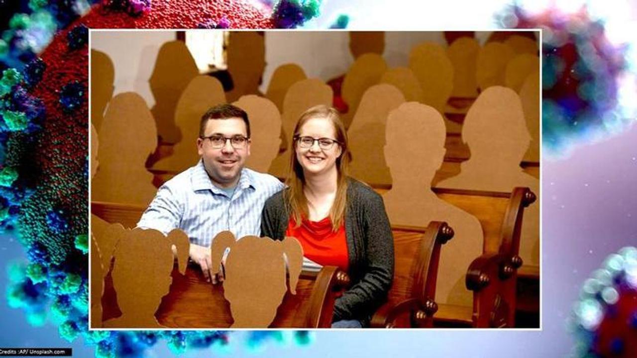 Cardboard cutouts replace guests at wedding as couple tie the knot amid coronavirus