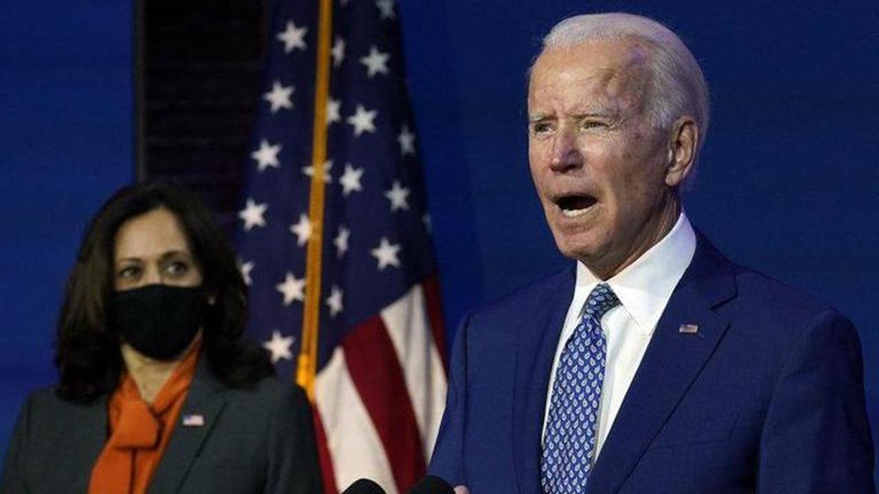 Biden defends health care law as high court mulls its fate