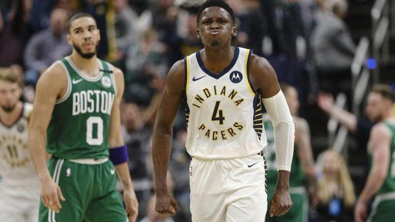 Celtics clinch playoff spot with 114-111 win over Pacers