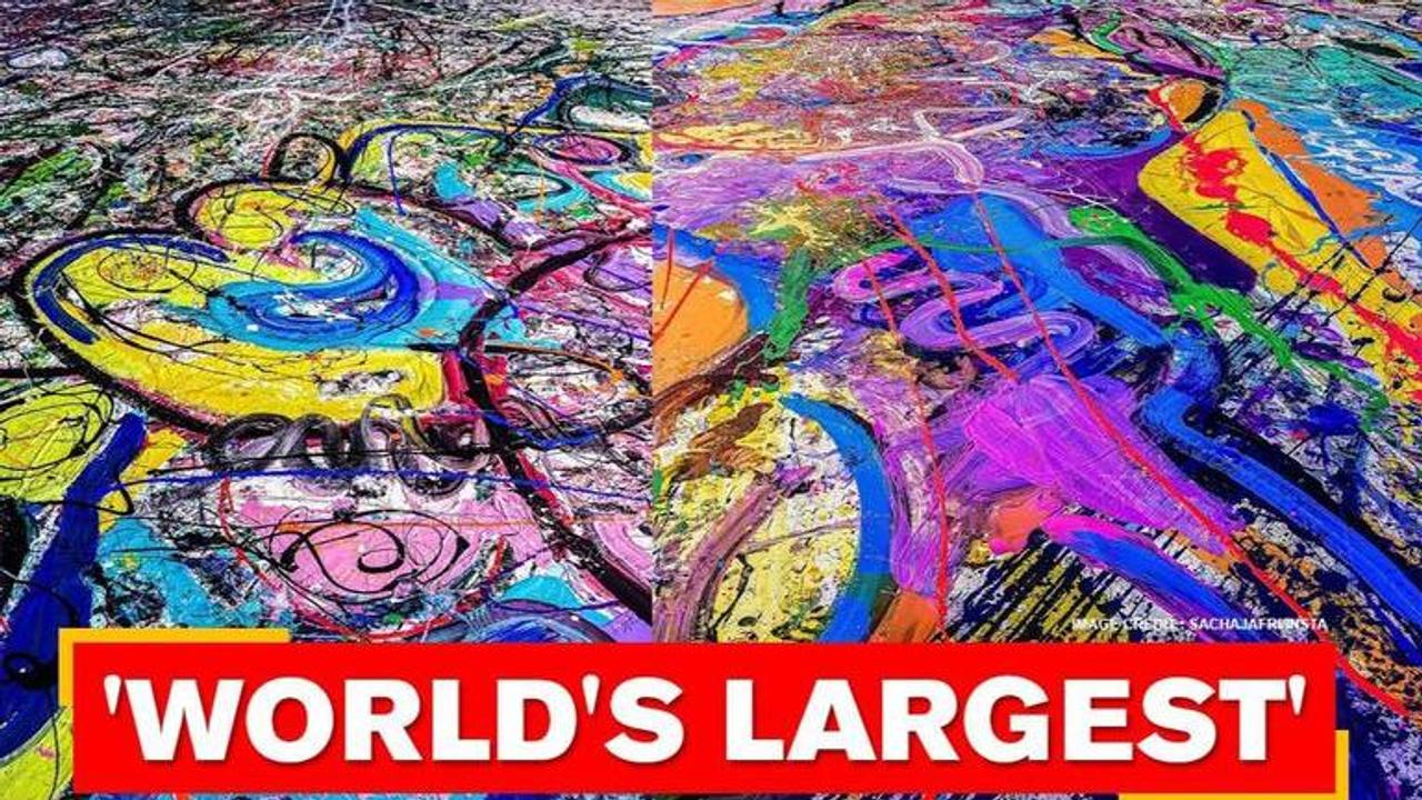 Artist creates world's largest painting on canvas to raise funds for children