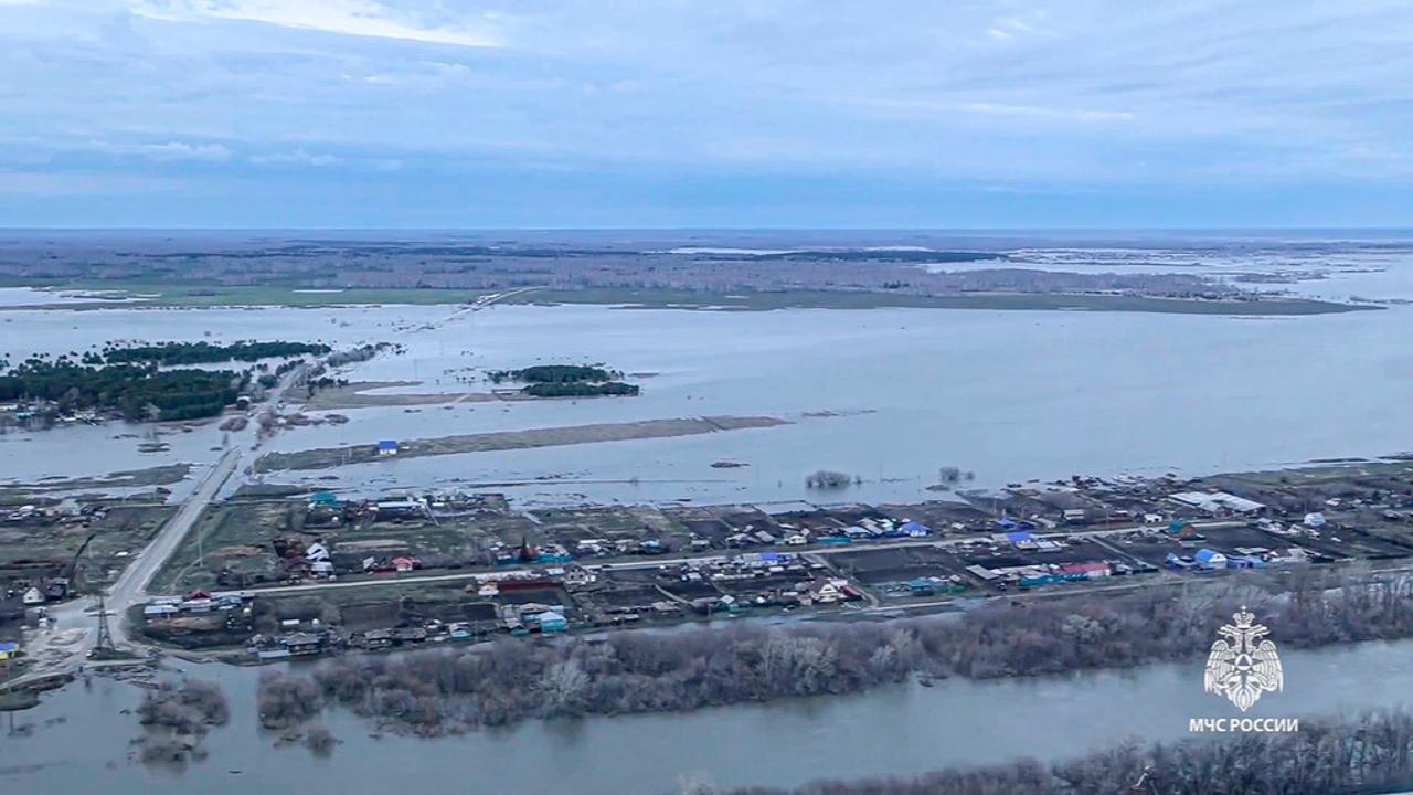 Nearly 14,500 homes have been submerged in the Russian region bordering Kazakhstan.