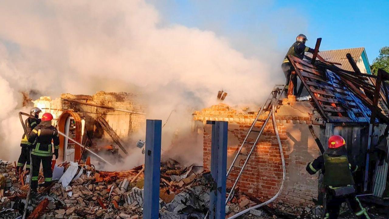 Ukrainian emergency services responding to the aftermath of the Russian attack.