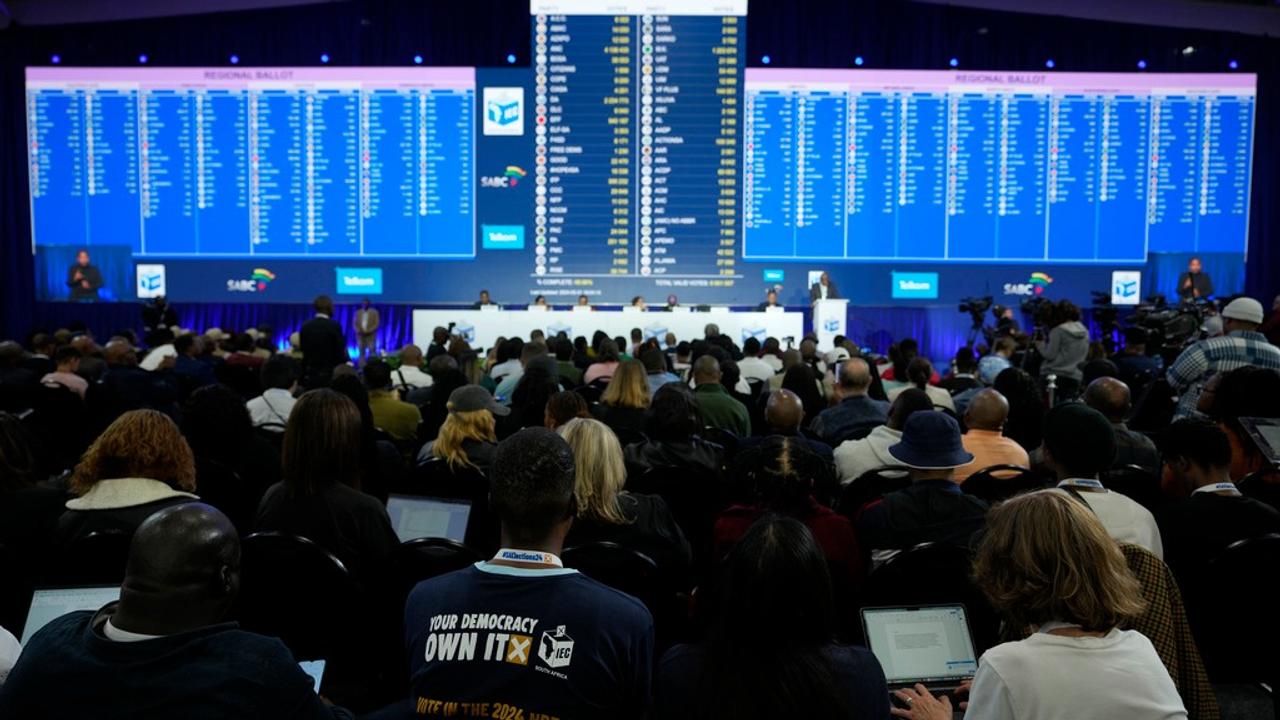 The latest election results are displayed at the Results Operation Centre (ROC) in Midrand, Johannesburg on Friday. 