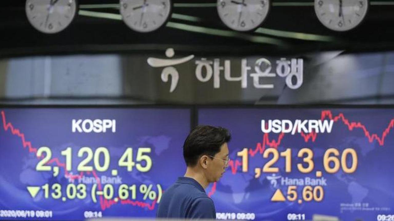 Asian stocks mixed amid concern over coronavirus hotspots