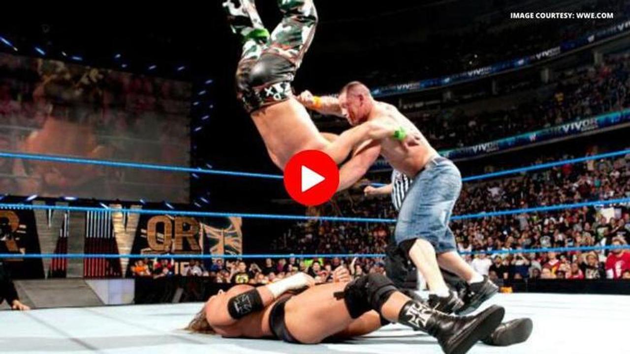 John Cena defeats Triple H, Shawn Michaels