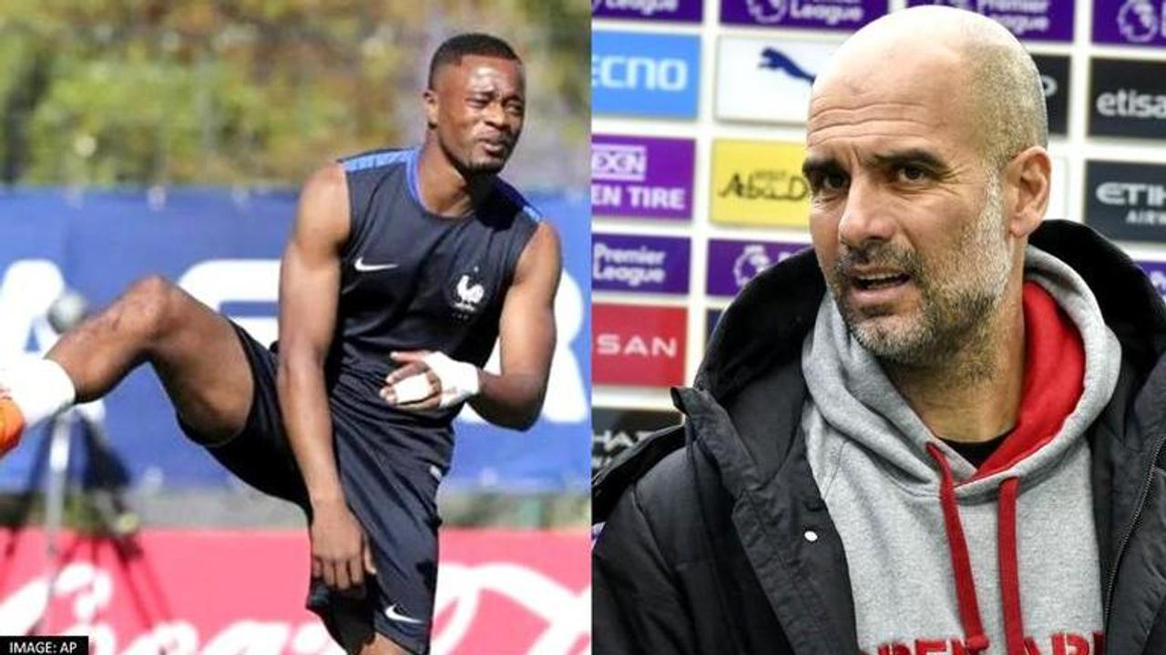 Manchester United legend Patrice Evra and Manchester City coach Pep Guardiola