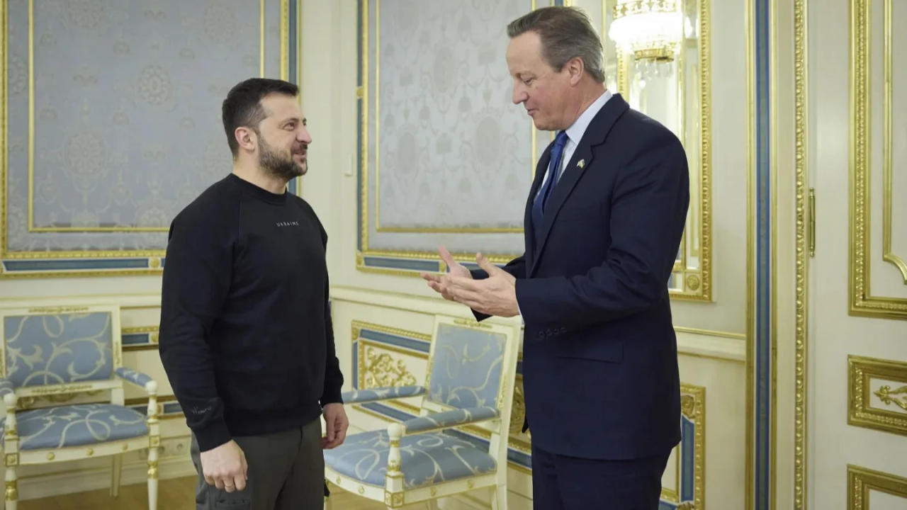 Ukrainian President Volodymyr Zelenskyy with Britain's Foreign Secretary David Cameron.