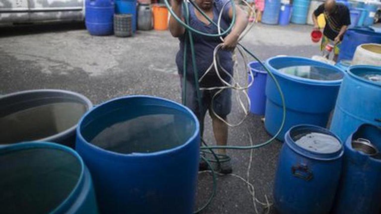 People scramble for water across Venezuela