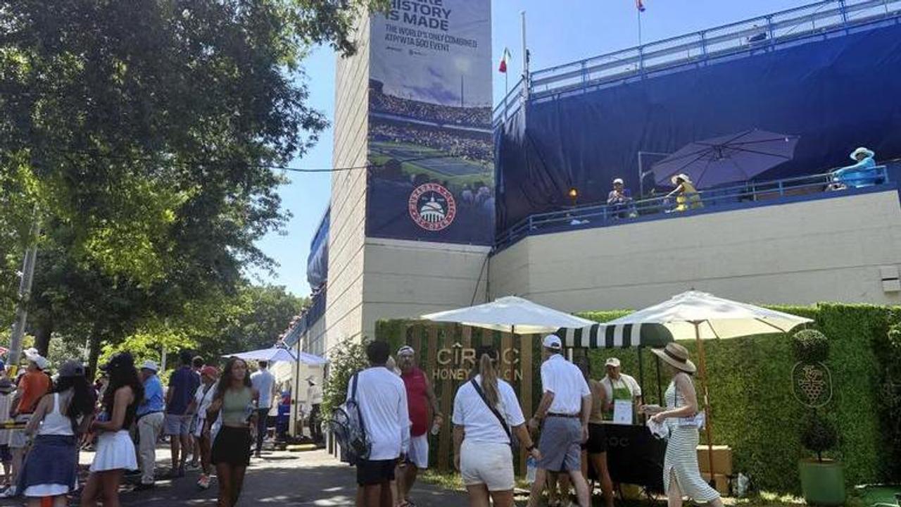 Climate protesters briefly interrupted a tennis match between Andy Murray and Taylor Fritz in DC