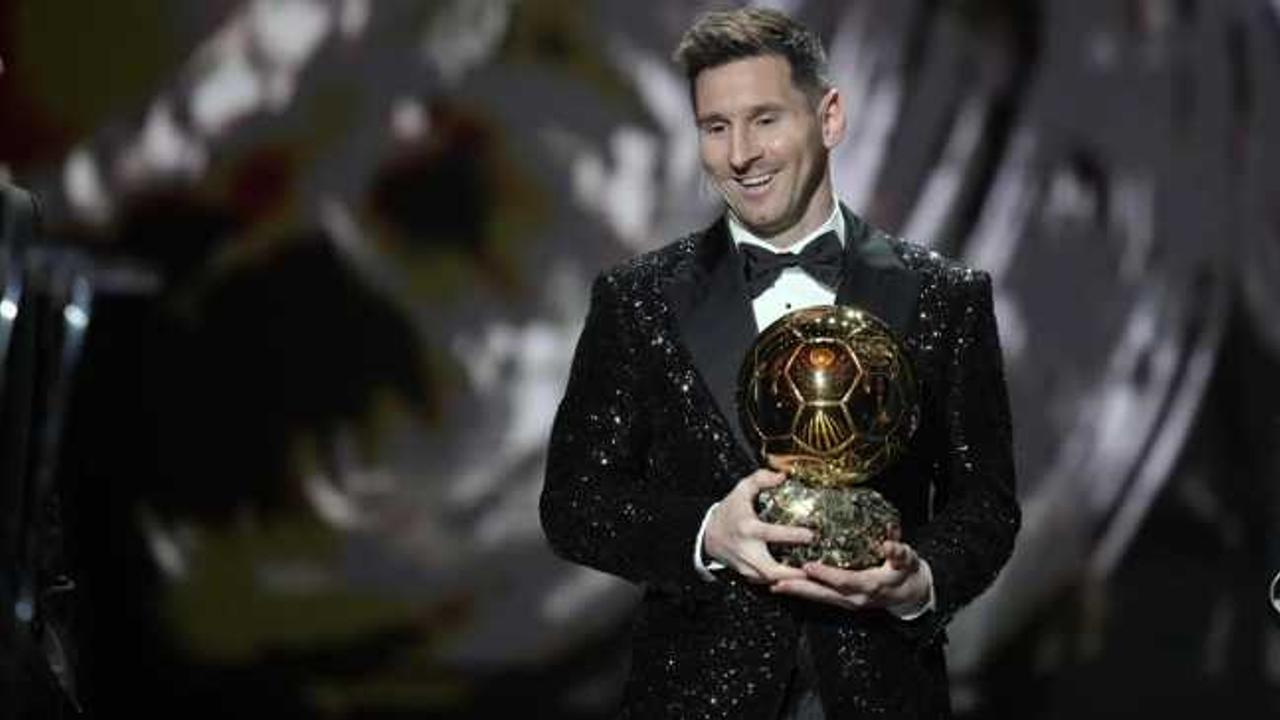 Lionel Messi with the Ballon d’Or