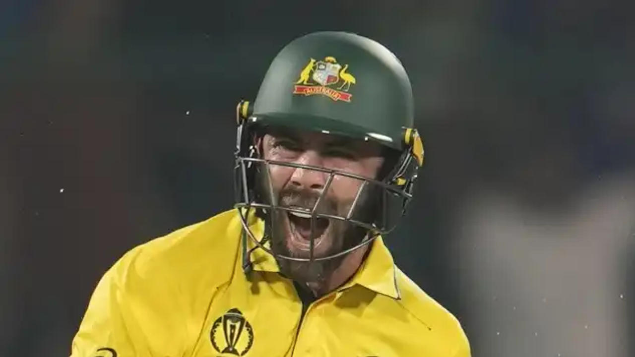 Glenn Maxwell reacts after reaching his century