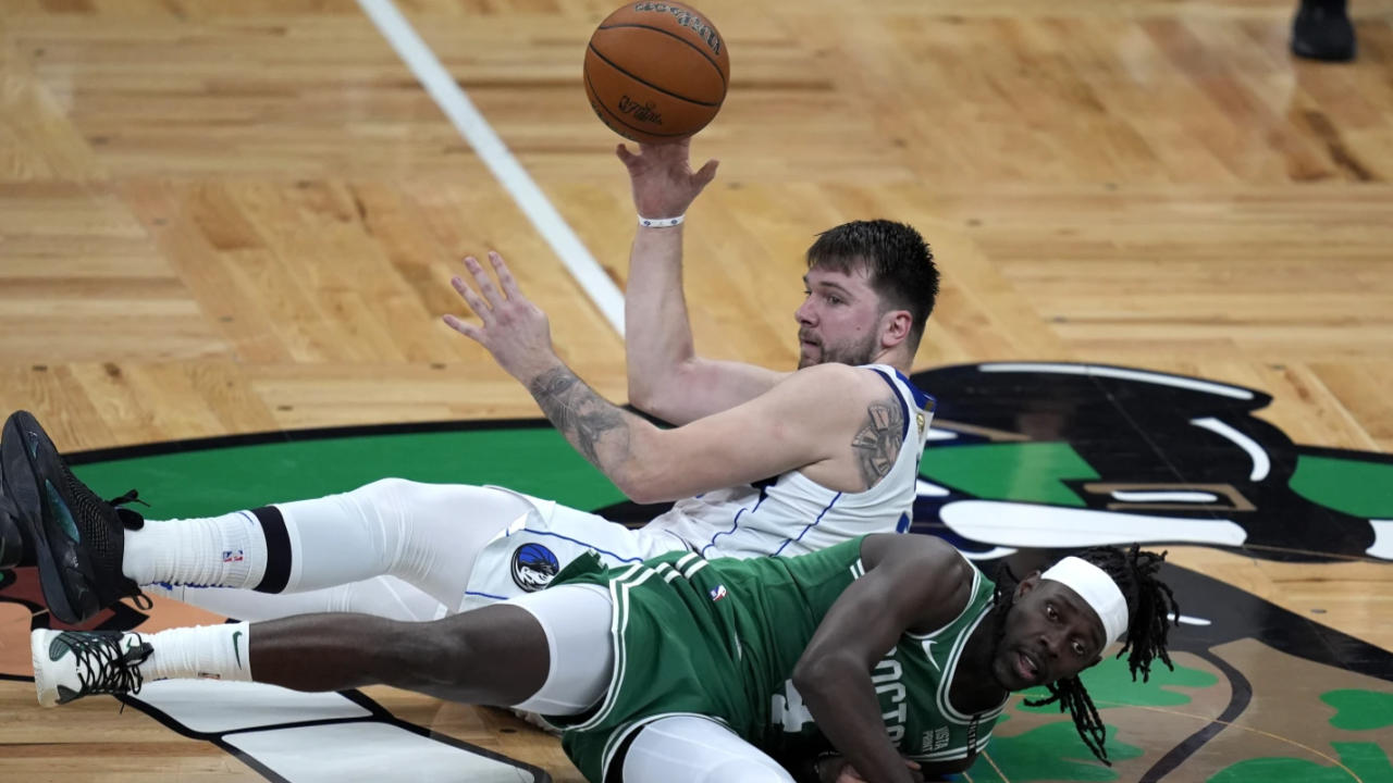 Luka Doncic and Jrue Holiday 