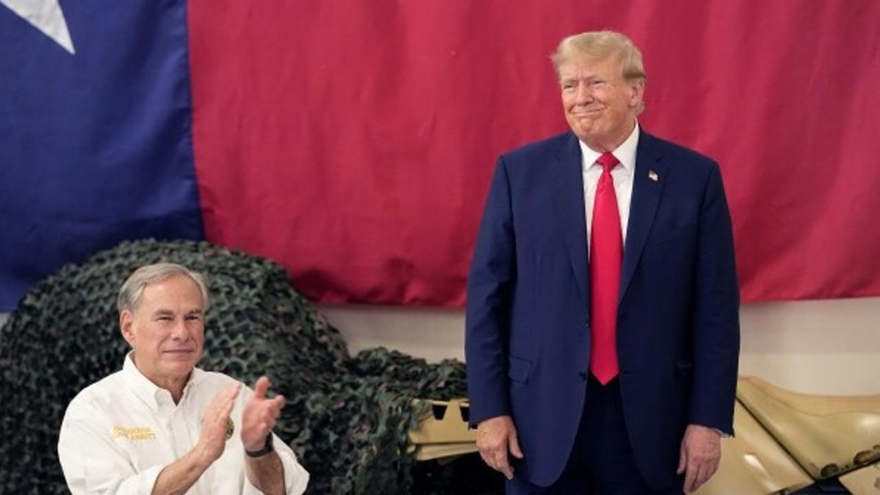  Republican presidential candidate and former President Donald Trump, right, is introduced by Texas Gov. Greg Abbott at the South Texas International Airport