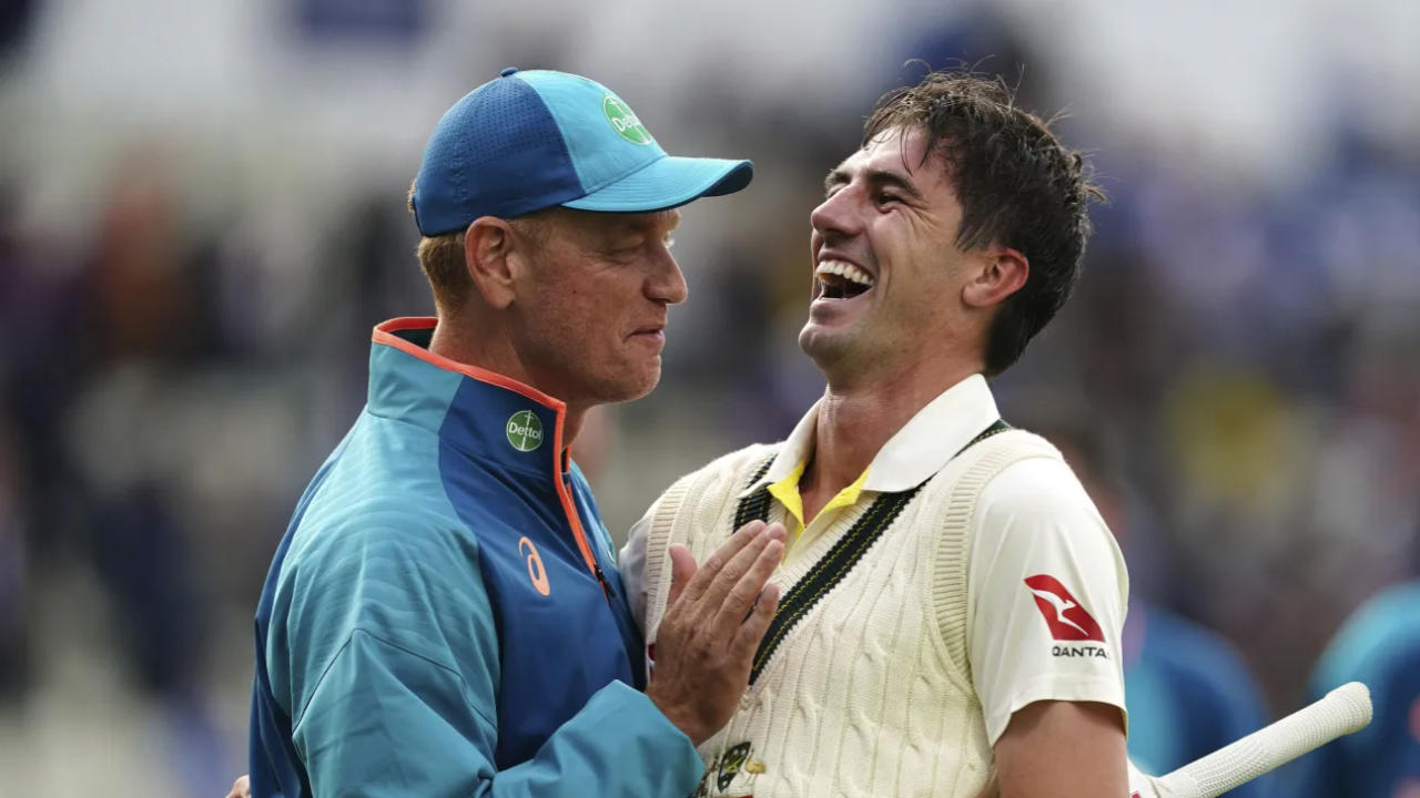 Pat Cummins with Australia head coach Andrew McDonald