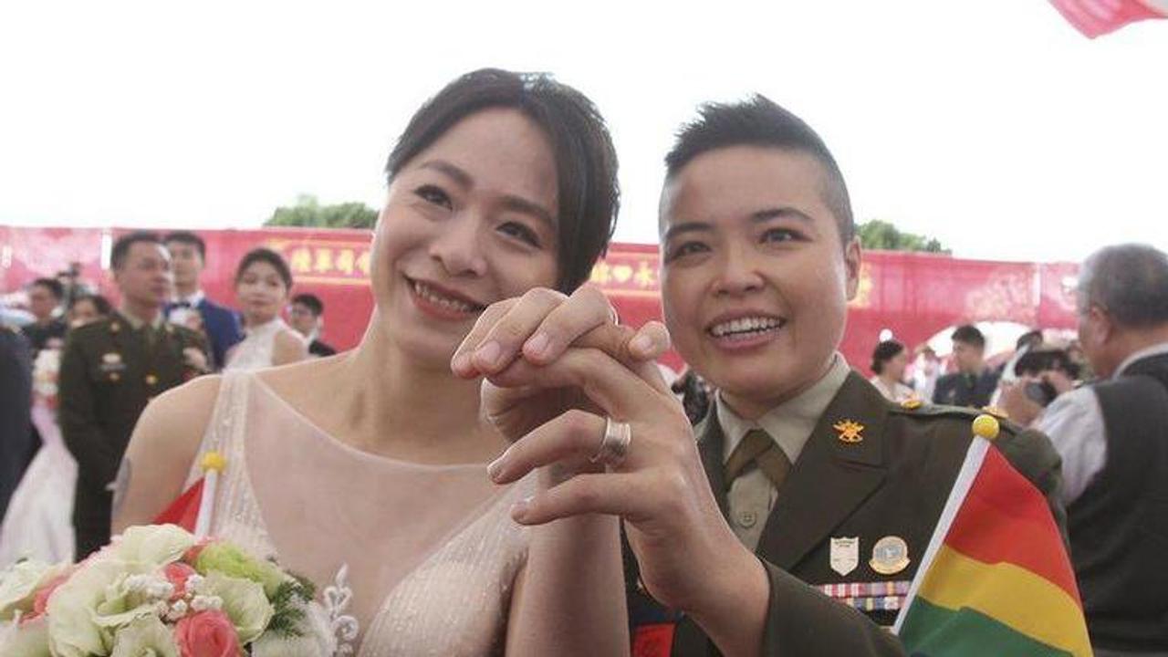 Two same-sex couples in military marry in first for Taiwan