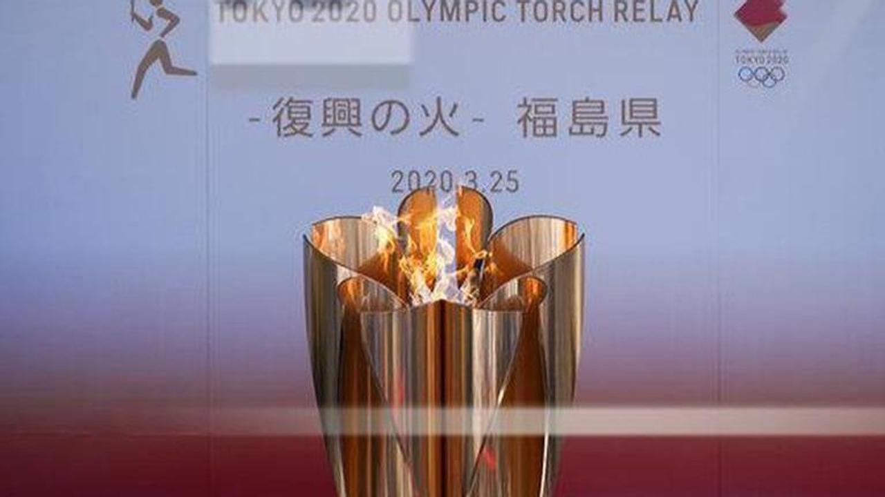 Visitors see Olympic flame on special display