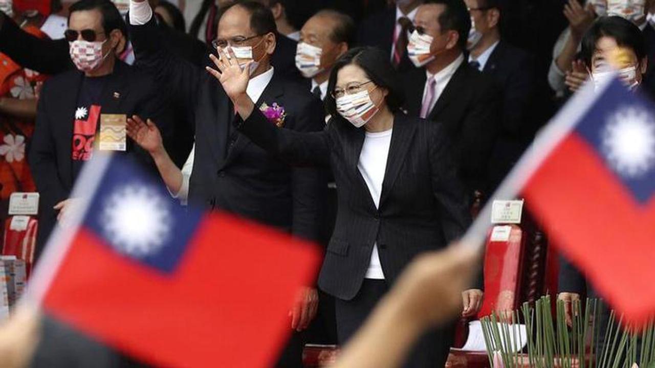 Tsai hopes for less tension with China on National Day