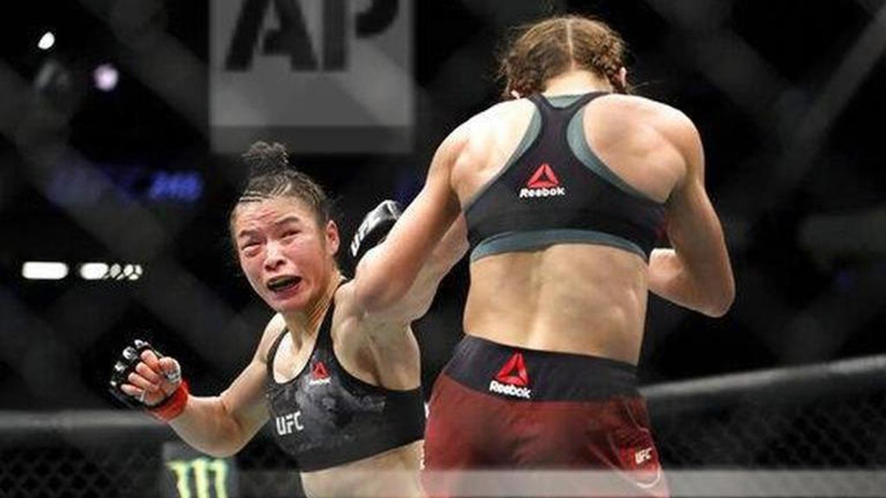 Zhang keeps title in brutal win over Jedrzejczyk at UFC 248