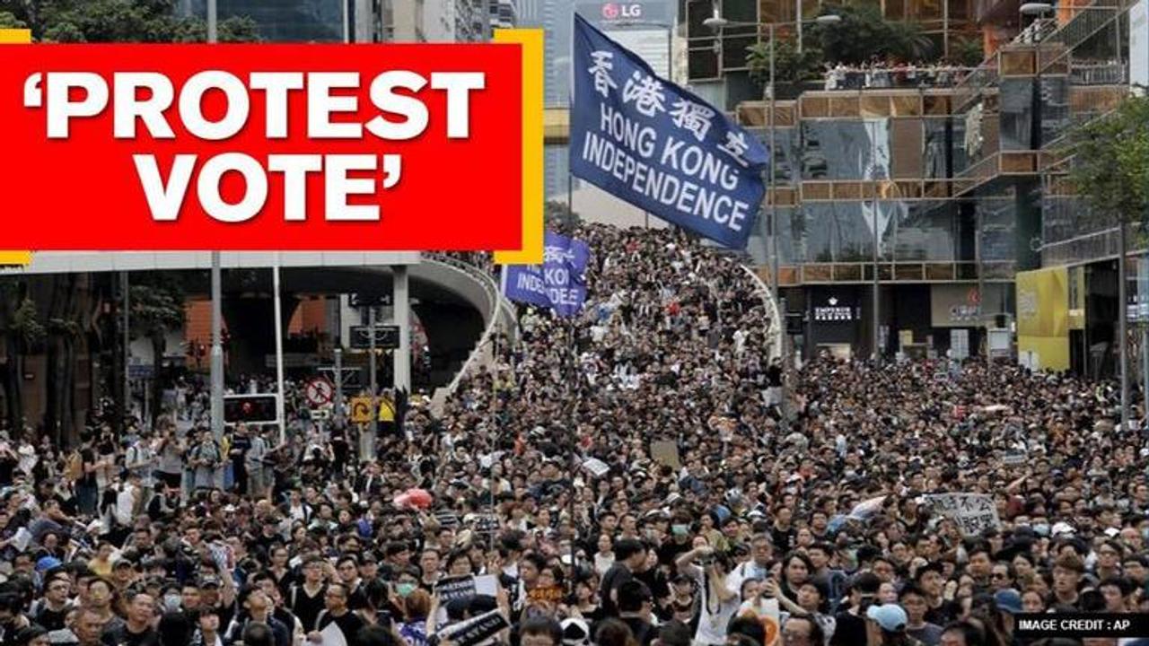 Hong Kong: Residents flock polling booths to vote against security law