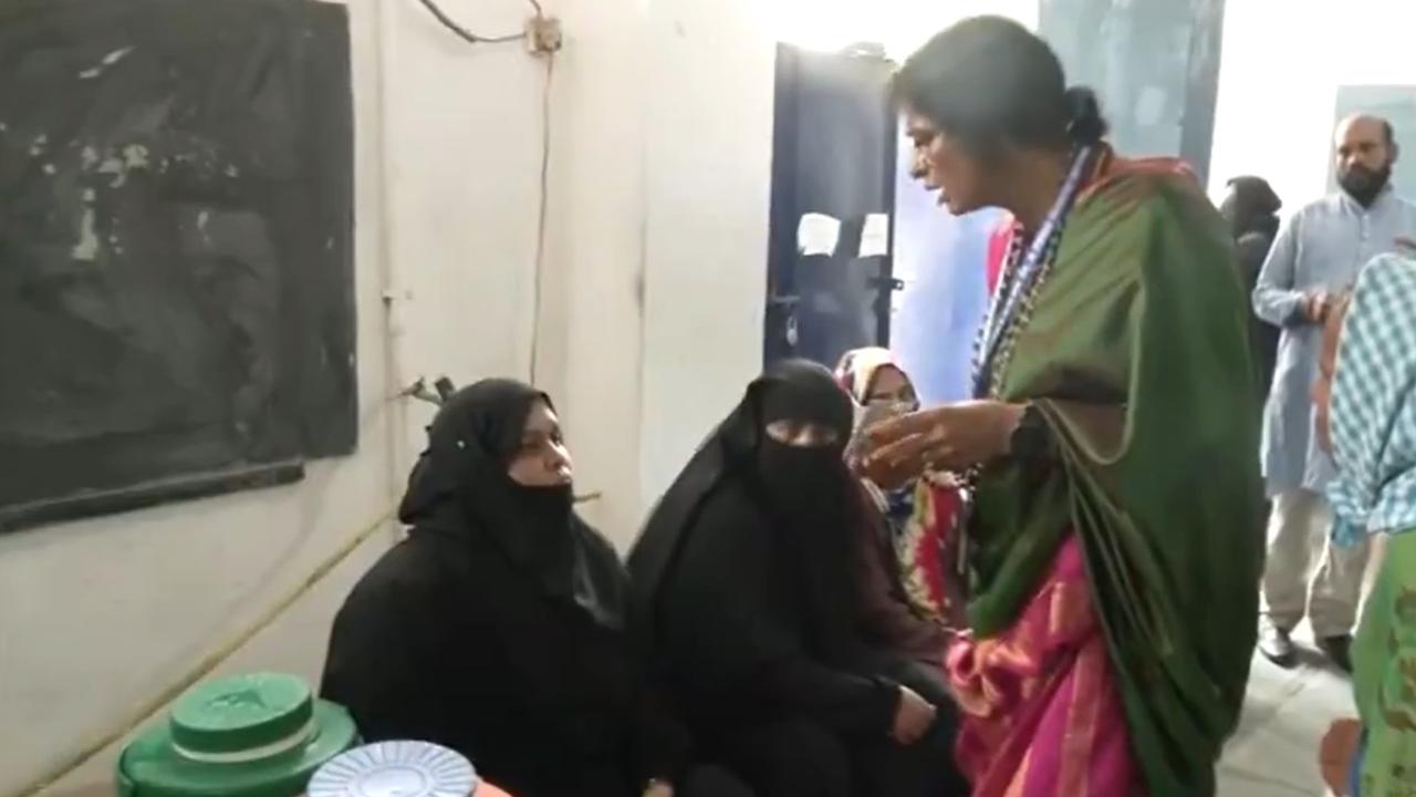 Hyderabad constituency BJP candidate Madhavi Latha visits a polling booth.