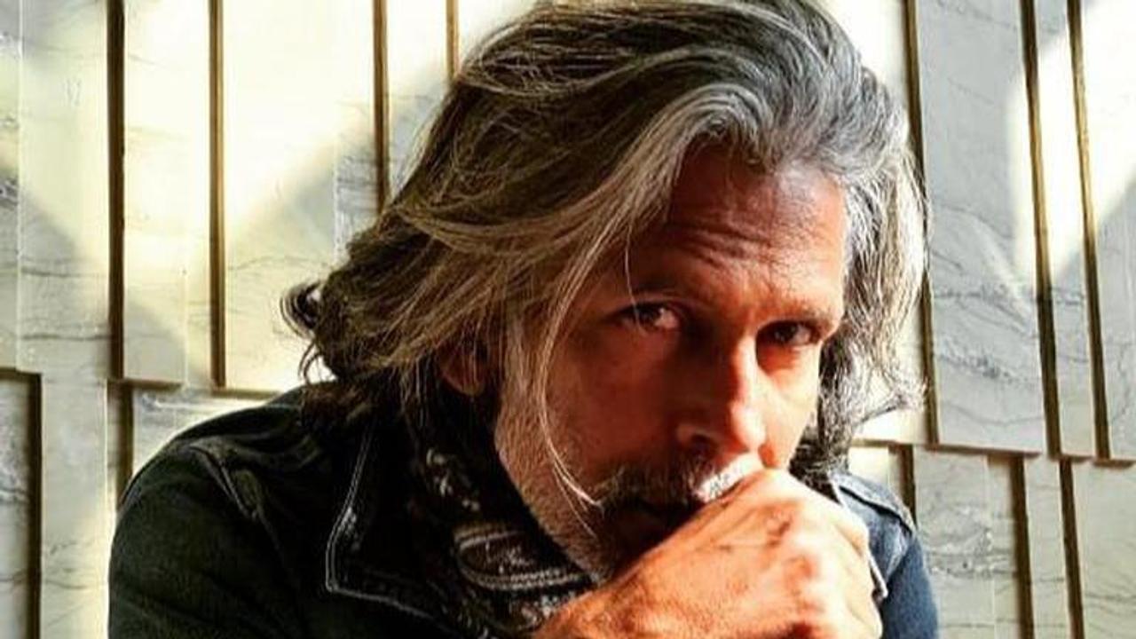 Milind Soman recalls time he had colored hair for professional assignment, shares old pic