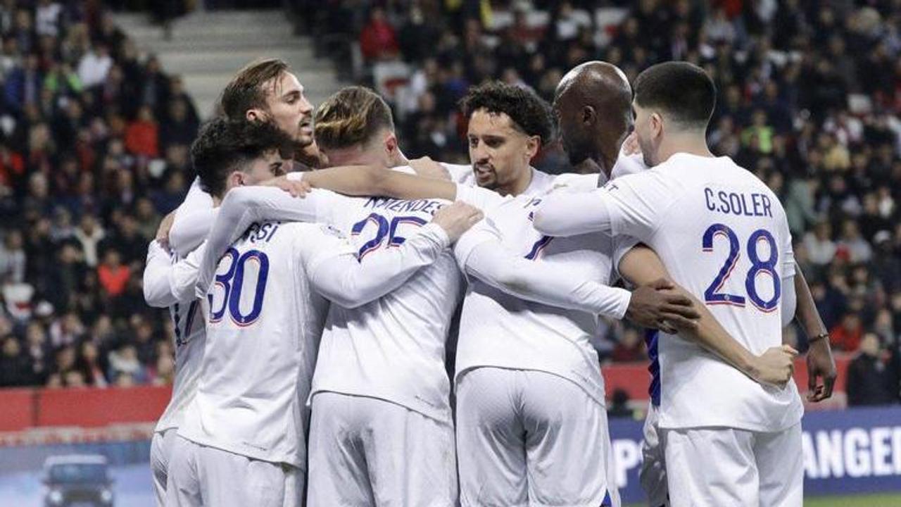 Players of PSG in huddle