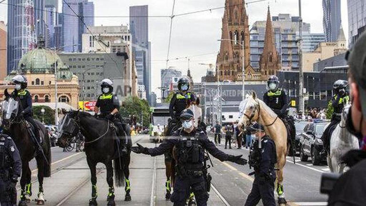 The Latest: Lockdown largely ending in Melbourne, Australia