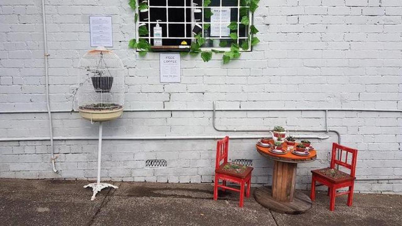 Australian offering free coffee from his window